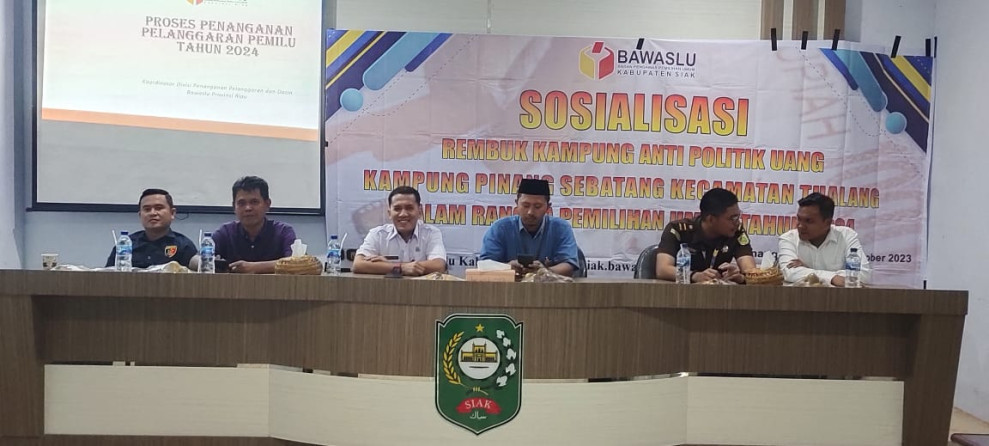 Personil Polsek Tualang Hadiri Sosialisasi Rembuk Kampung Anti Politik Uang